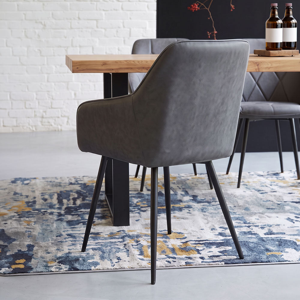 Sibilla – Poltroncina in ecopelle con gambe in acciaio nero